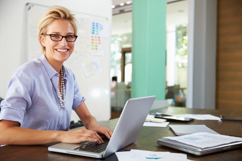 Portrait Of Businesswoman Working In Creative Office